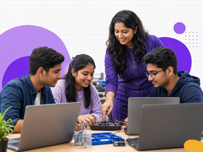 Indian professional trainer guiding a practical digital-skills cohort